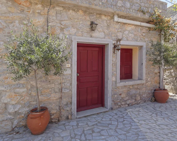 House entrance with flowerpots — Stock Photo, Image