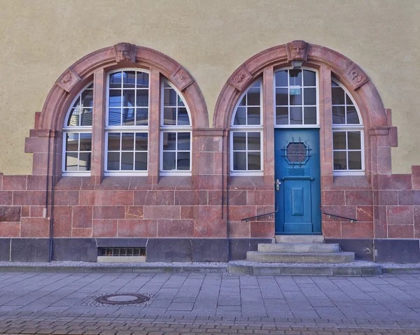 Entrance with arched blue door and windows, central Europe — Stock Photo, Image