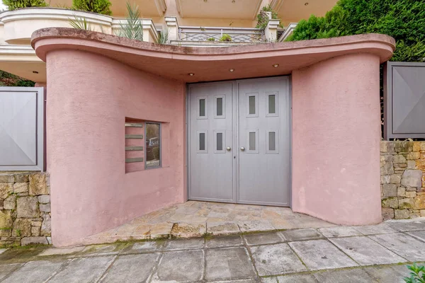Modern Apartment Building Pink Elliptic Shape Entrance Metallic Grey Door — Stock Photo, Image