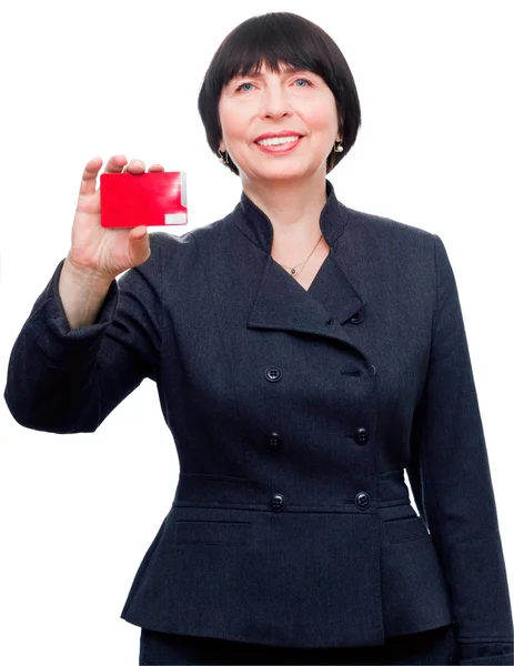 Ώριμη χαμογελαστό γυναίκα των επιχειρήσεων κατέχει μια πιστωτική κάρτα Φωτογραφία Αρχείου