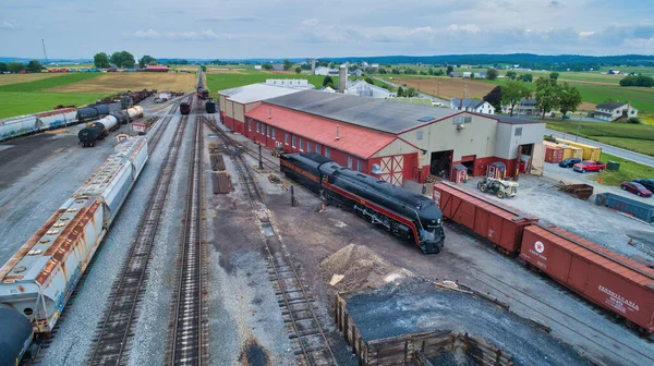 Aerial View of a Freight Yard with an Antique Steam Engine and Freight and Engine Üzletek — Stock Fotó