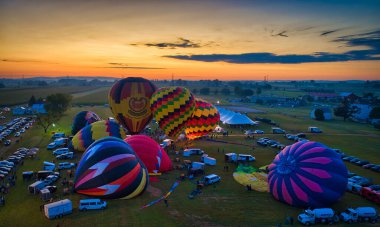 Aerial View of Many Hot Air Balloons Getting Ready to Take Off