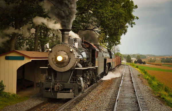 Antique Restored Steam Freight Train Approaching Blowing Smoke and Steam