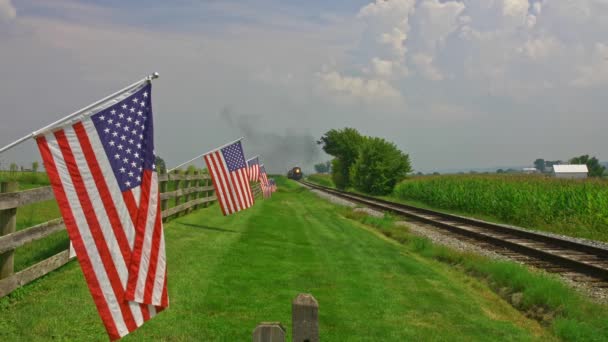 View Line Gently Waving American Flag Fence Farmlands Steam Passenger — Stock Video