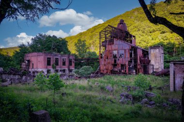 A Late Afternoon of the Ruins of an Old Lumber Mill Over One Hundred Years Old, in Late Afternoon.