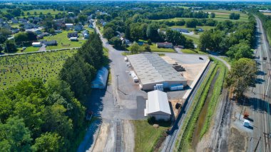 A Drone View of a Freight Yard Being Built in the Middle of a Countryside on a Sunny Day