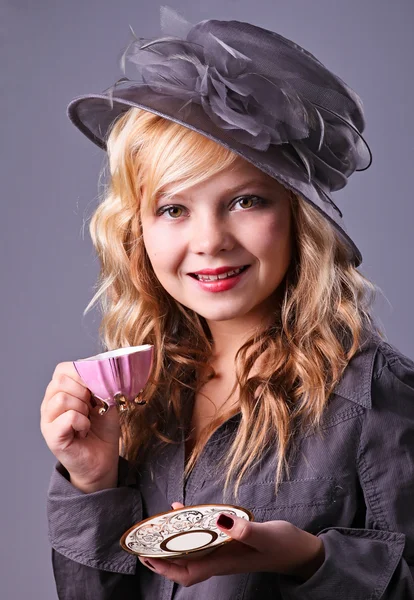 Beautiful young girl at a tea party — Stock Photo, Image