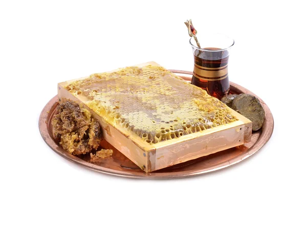 Fresh honeycombs with honey on plate ,cup of Turkish tea,propolis — Stock Photo, Image