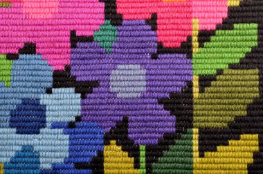 El işlemesinin makro doku parçası işlemeli kumaş, arkaplan