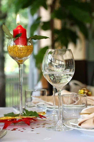 Restaurant table with glasses and candle