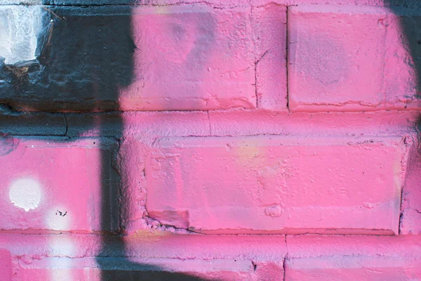 Kolorowe graffiti obejmuje mur z cegły — Zdjęcie stockowe