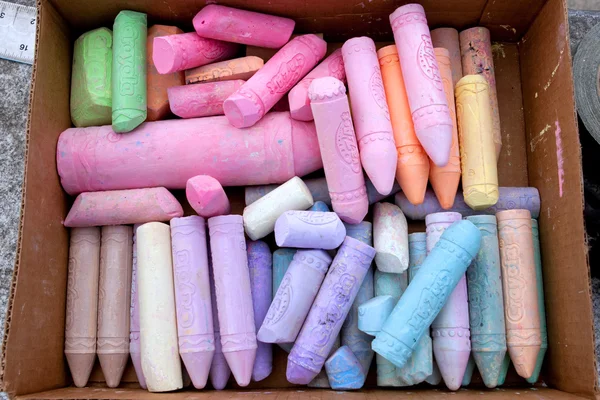 Box Of Colorful Chalk Being Used For Sidewalk Art — Stock Photo, Image