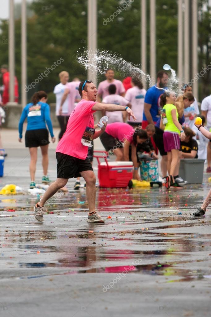 Man Throws Water Balloon In Group Fight After 5K Race Stock Editorial