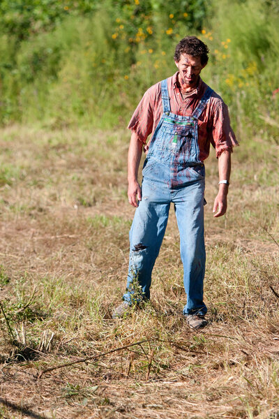 Bloody Male Zombie Waits For Runners In Scary 5K Race