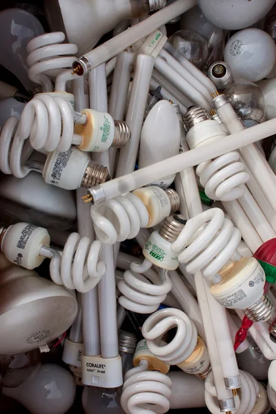 Collection Of Discarded Light Bulbs At Recycling Event — Stock Photo, Image