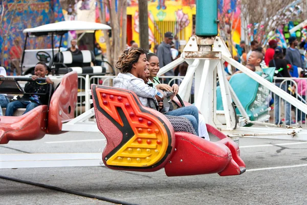 Women Laugh Riding Scrambler Carnival Ride — Stock Photo, Image