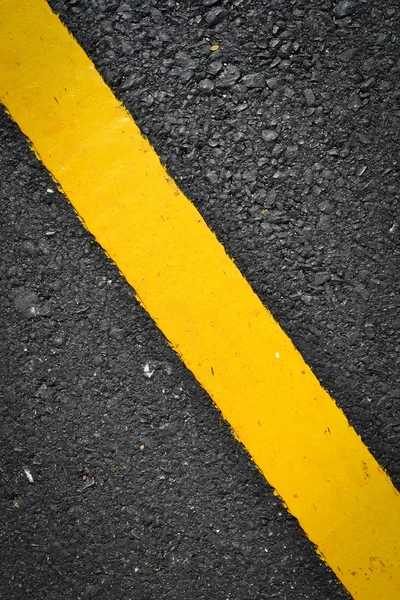 New yellow line on the road texture — Stock Photo, Image