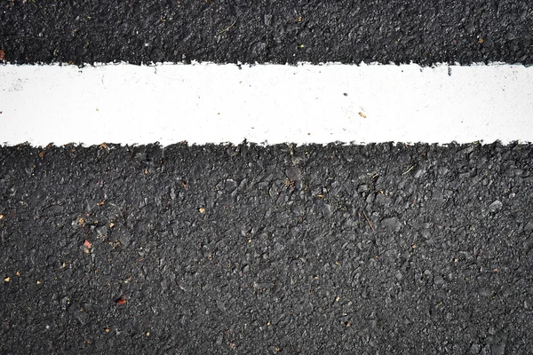 Nová bílá čára na silnici textury — Stock fotografie