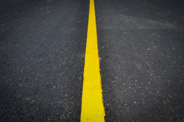 Nueva línea amarilla en la textura del camino Imagen De Stock
