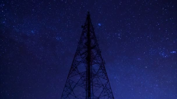 Time lapse big communication tower and beautiful startrail in the night sky