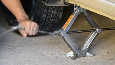 Man use manual small jack