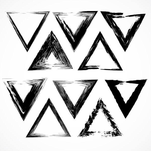 Conjunto vectorial de pinceladas de triángulo grunge . — Vector de stock