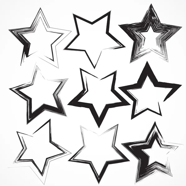 Ensemble vectoriel de coups de pinceau étoile grunge . — Image vectorielle