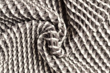 Buruşmuş gri havlu. Buruşmuş kumaş parçası..