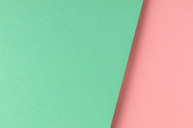 Pembe ve turkuaz renkli kağıt arkaplan.