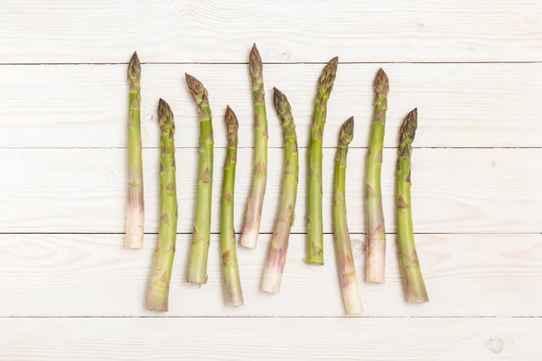 Asparagus Stems White Wooden Table Top View — Stock Photo, Image