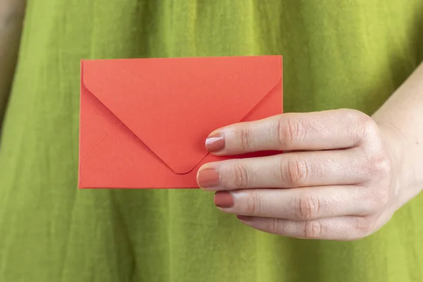 Woman Holds Red Envelope Her Hand Copy Space — стоковое фото