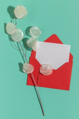 Red envelope and blank greeting card. With copy space.