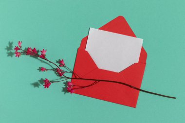 Red envelope and blank greeting card. With copy space.