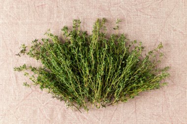 Fresh green thyme on the table. Top view.