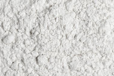 Organic white wheat flour. Top view, full frame photo.