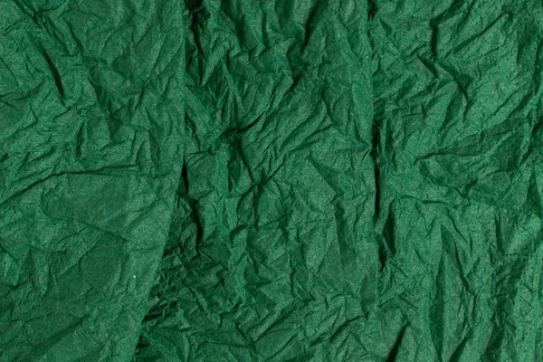 緑の紙の背景を砕いた フルフレームテクスチャ — ストック写真