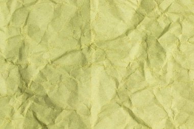 Yeşil buruşuk kraft kağıtlı arka plan. Tam çerçeve dokusu.