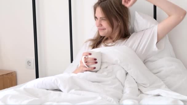 Young Happy Woman Stretching Bed Waking Enjoying Morning Freshly Brewed — Video Stock