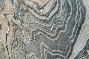 Eski, kırık, çatlak mermer. Onarılmış mermer.