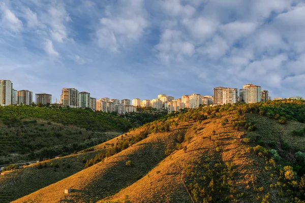 Apartment buildings on the top of the hills at sunset, Ankara, Turkey