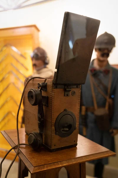 Antique camp telephone used during old wars in 20. century.