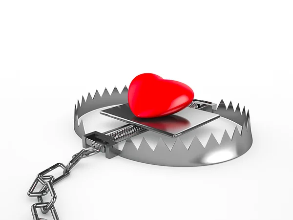 Red heart in a trap, isolated on white background — Stock Photo, Image