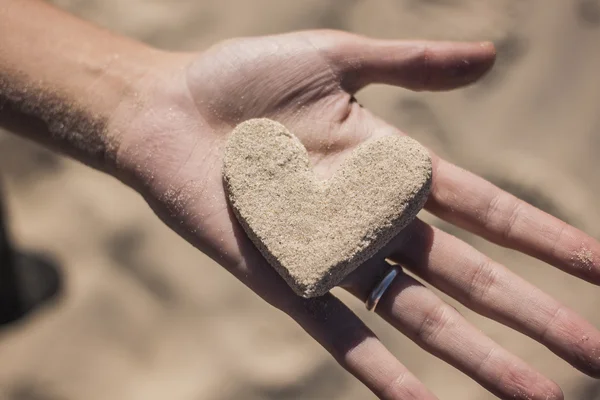 Heart made with white sand — Stock Photo, Image