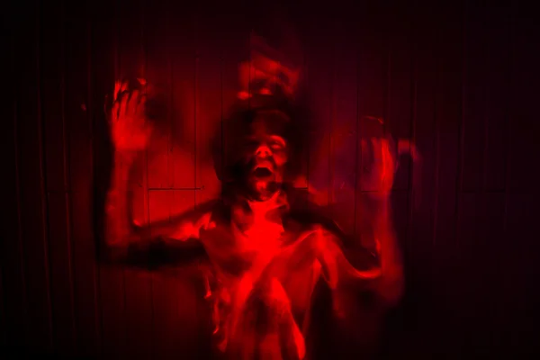 Человек в огне, сделанный с помощью световых пуантов Стоковое Фото
