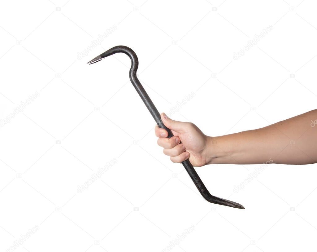 Metal black crowbar in a man's hand on a white background, isolate. Close-up
