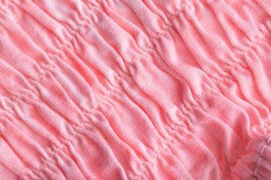 Pembe kıvrımlı kumaş, fon. Makro