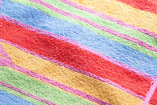Tissu molleton multicolore avec rayures, macro. Contexte : — Photo