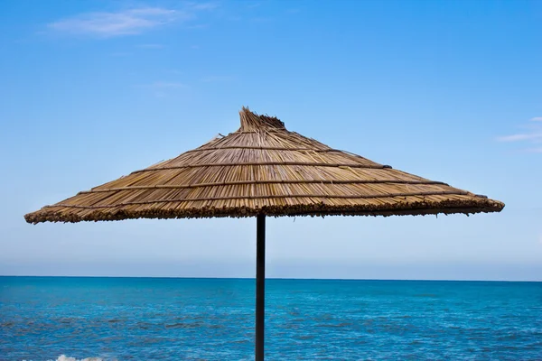 Deniz, dagomys, bambu yapılmış şemsiye