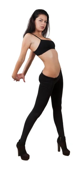Young pretty girl dancing in leggings and top — Stock Photo, Image