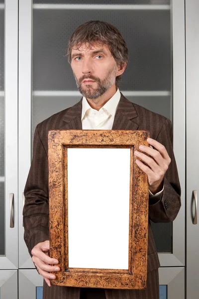 Mannen i kostym med bild — Stockfoto